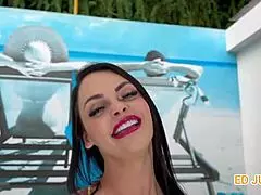 A wife interacts with Ed Junior while the husband records