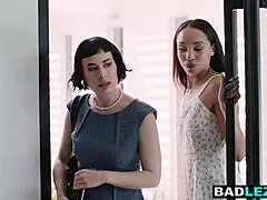 in a steamy encounter, this slender ebony realtor bends over to fuck her busty blonde lesbian milf client using a big strapon dildo on those massive tits and curvy ass