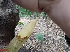 Perverted Slut Squirts Piss From Wooden Stake In Forest