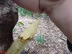 Perverted Slut Squirts Piss From Wooden Stake In Forest