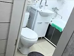 stepmom was sitting in the toilet but stepson saw her and fucked her in anal