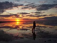 walk on red sunset of elton salt lake, tits outdoor