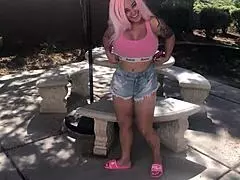 Curvy Barbi with pink hair gets attention from Rome Major