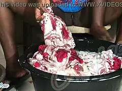 as a dedicated housewife, i tackle the weekend laundry routine, folding clothes neatly in our cozy home.