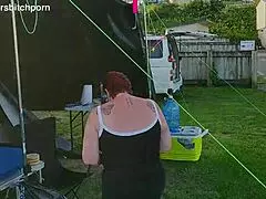 filthy kiwi mature milf squats to piss on the campground ground with campers nearby, staying submissive