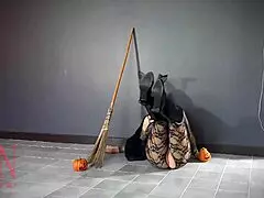 Halloween Witch in Regina Noir Style with Pumpkins and Broom Regina Noir as Velma Dinkley in Yellow Pantyhose Performing in Old House at Stairway