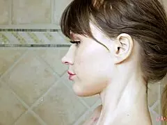 charming blonde girl enjoys hot shower 😍