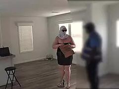 Delivery guy helps busty milf with package in mini dress