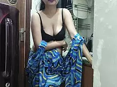 The indian stepmom feels so aroused watching her stepson, then enters the kitchen to fuck him passionately