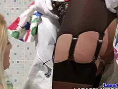 classy mature lesbian licks pussy in stockings, tattooed and glamorous