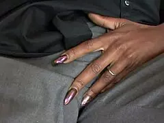 Jayna Lynn in stockings and shoes on the bed with a partner