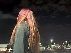 Artemisia Love smokes outdoors in Los Angeles at night