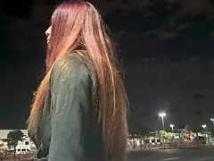 Artemisia Love smokes outdoors in Los Angeles at night