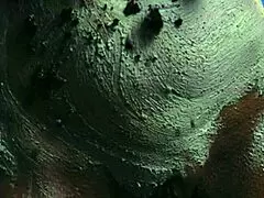 Girl gets messy with food on birthday cake