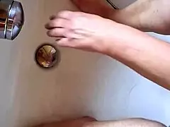 Washing dirty feet in the bathtub at home