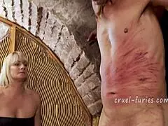 Cruel Blonde Milf Whips Guy's Cock Brutally
