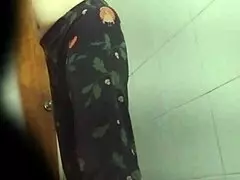 Spying on mother-in-law shaving her pussy outdoors.