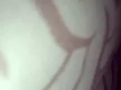 A story of a slim woman under the covers in an intimate moment