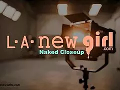 Striking dark-haired stunner shows her sexy body!