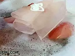 enchanting brunette muse enjoys a sensual bath