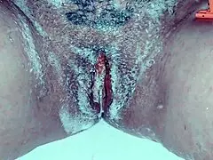 milf shaving her pussy up close with lots of soap