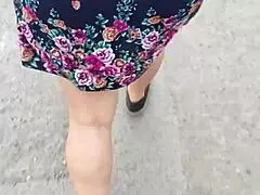 Following And Lifting Woman's Skirt On The Street