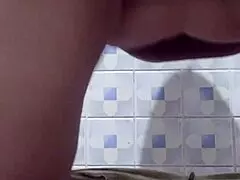 Mature BBW milf rides pussy in public bathroom