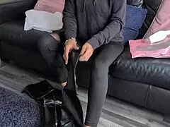 a british housewife tries on lingerie with stockings and corset