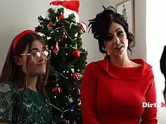 Step family lines up asses under the christmas tree for group fun.