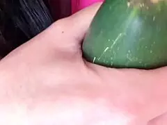 'I was hot, spread legs, no panties, shaved pussy, cucumber in big pussy, rubbed hard.'