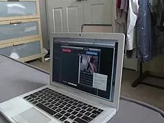 Brunette mom sucking big cock while fingering herself in stockings