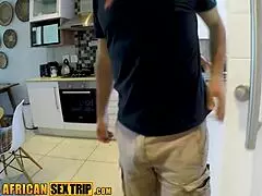 The ebony MILF in the KITCHEN with a BIG WHITE DICK leading to a CUMSHOT.