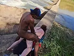 Two sluts get fucked in the river with big black cocks