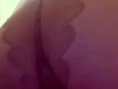 Mistress elza koms wears nylon on her ass, showcasing her glamorous domination style.