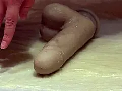 Does this plump mistress pee on the rubber dick in heels?