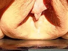 Maturemons sexy mature shows humongous soaking wet meaty cunt flaps in slow motion