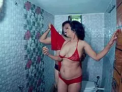 Desi stepmom gets fucked hard in the bathroom by her stepson, moaning loudly during rough anal and creampie