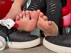 Goddess teases wrinkled feet in socks and barefoot under desk