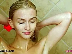 Cute teen blonde showers provocatively!