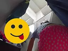 Hidden camera captures curvy milf in fitting room voyeur fetish