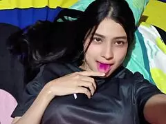 A Colombian woman touches her nice body in a homemade video.