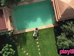 Petite Asian milf teases with pool strip while slender blonde babe bares her curves.