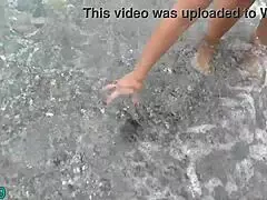 Nudist Beach Slut Shoves Stone Deep in Ass and Pussy for Wild Masturbation