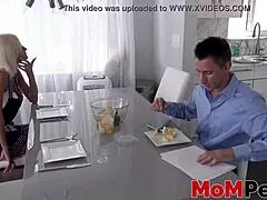 blonde milf kneels sucking stepsons hard cock right in front of clueless husband