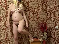 A pregnant MILF tries jewelry before Christmas then MASTURBATES with comb