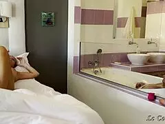 I'm stroking in the bath watching my wife fuck that dildo wall.