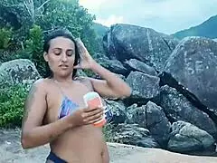 hey beach hottie asks stranger for sunscreen rubdown ends in facial cumshot!