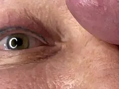 mature lady gets facecum with huge load right on her eye