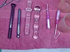 wanna see this lesbian shove piss deep into her uterus via peehole tube?