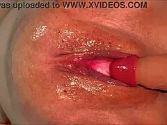 Halloween virgin shoves dildo deep in shaved wet pussy close up